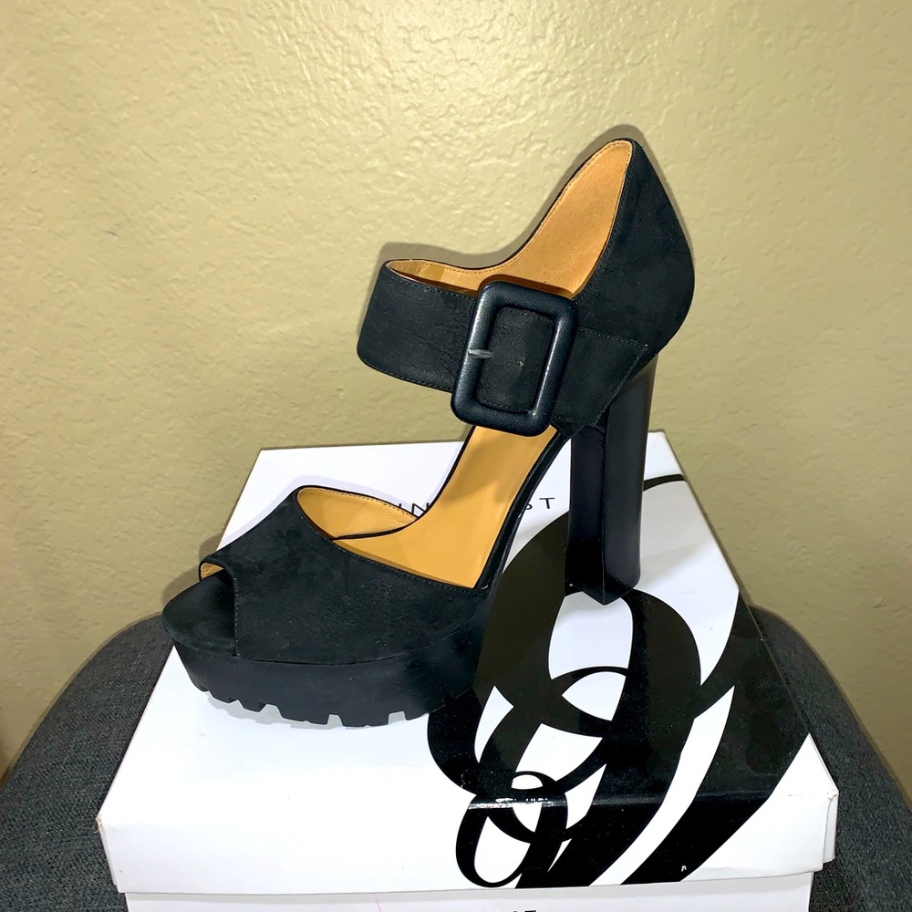 Unique! Suede like material heels. Barely worn.